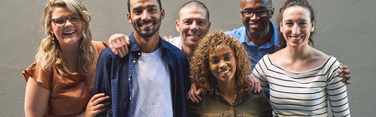 Shot of a group of cheerful friends standing together